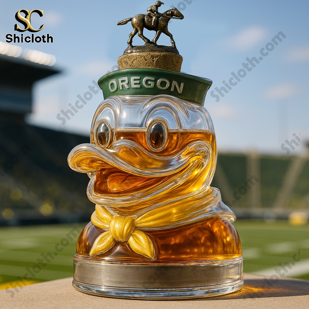 University of Oregon Duck Whiskey Bottle 12 Oregon Duck-shaped whiskey bottle with cork topper.