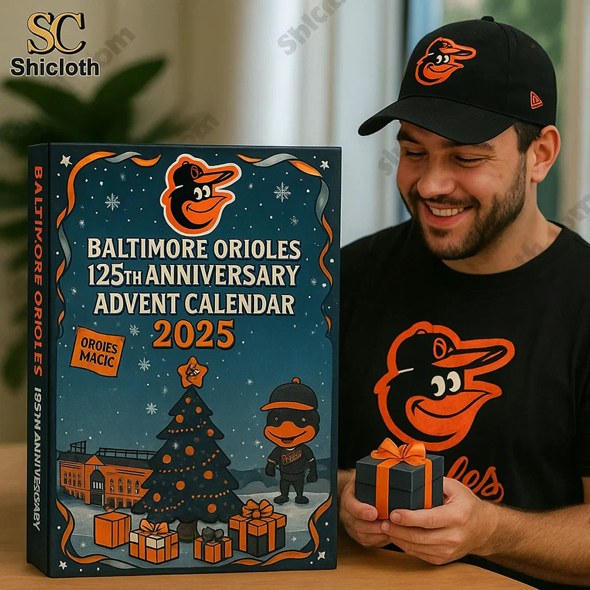 Man wearing Baltimore Orioles hat holding the Orioles 125th Anniversary advent calendar 2025.