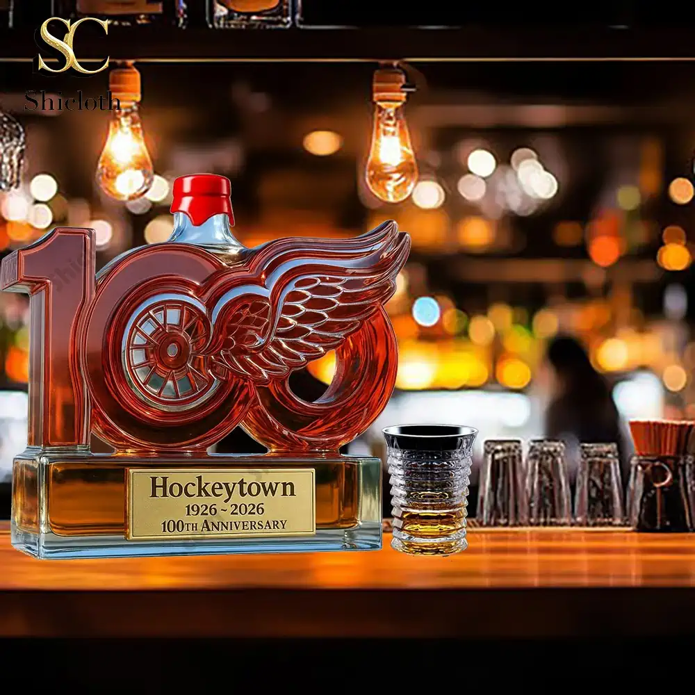 Detroit Red Wings 100th Anniversary whiskey bottle with red top by Shicloth.