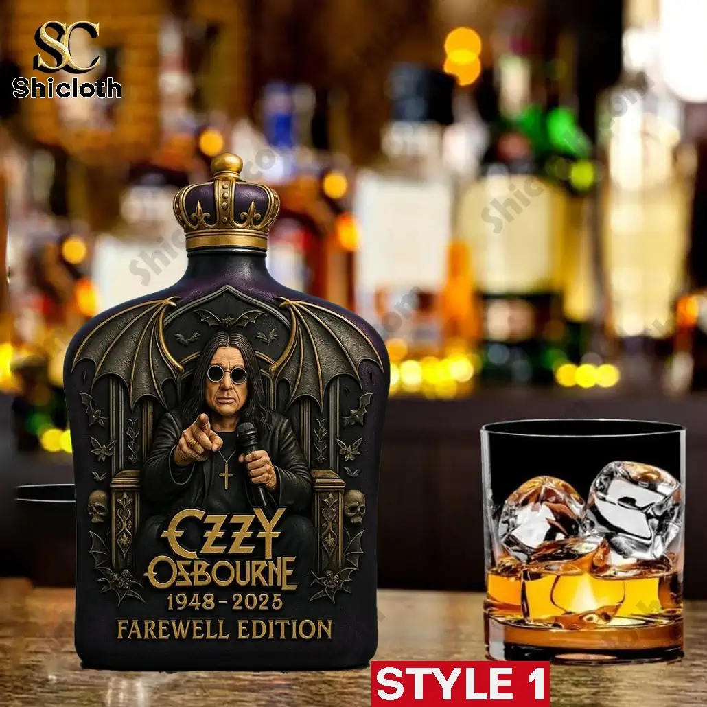 Ozzy Osbourne farewell edition whiskey bottle with golden crown cap displayed on a bar table.