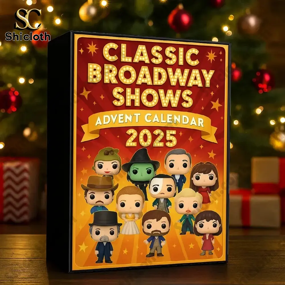Classic Broadway Shows 2025 advent calendar box displayed in front of a decorated Christmas tree.