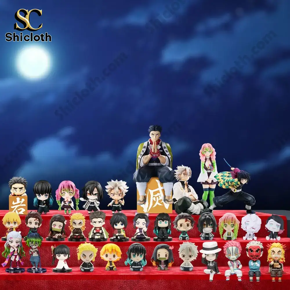 Demon Slayer character figurines displayed in front of an advent calendar box.