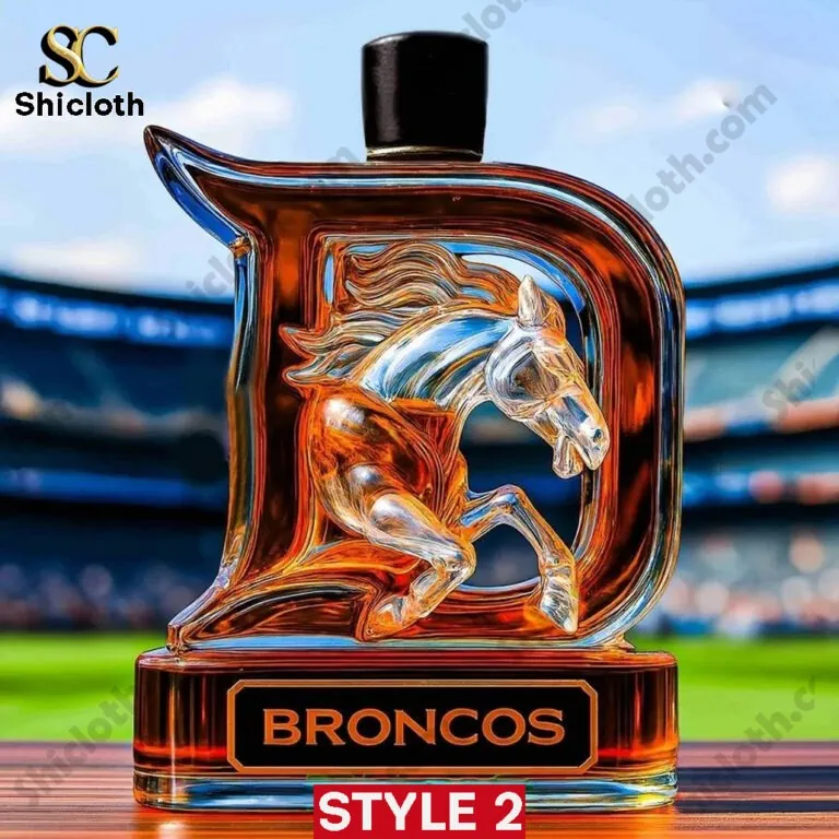 Denver Broncos star shaped whiskey bottle with black cap on a football field!