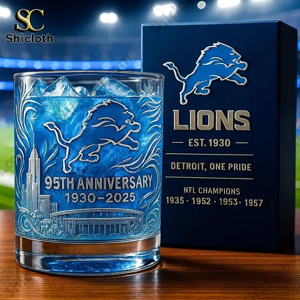 Blue anniversary whiskey glass with lion emblem by Shicloth