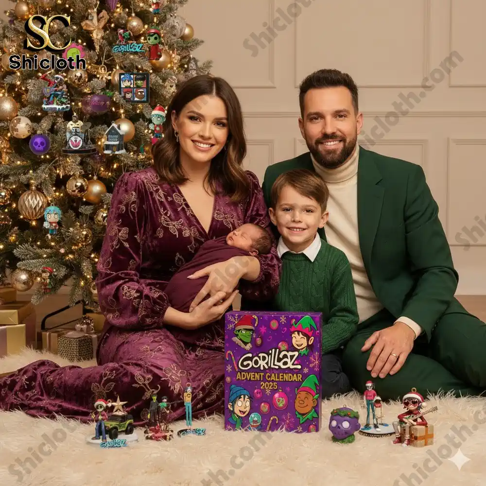 A family posing together with the Gorillaz Advent Calendar 2025 in front of a decorated Christmas tree.