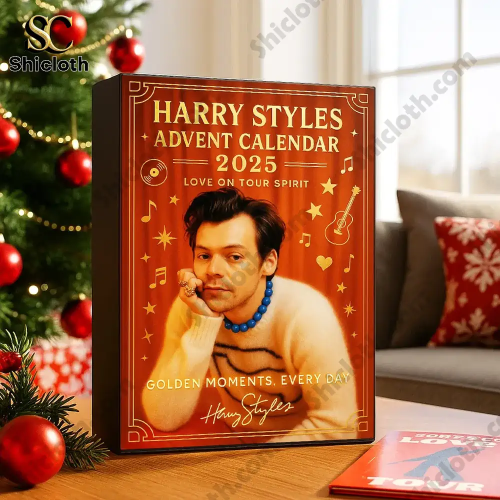 Harry Styles 2025 advent calendar box on a table near a Christmas tree.