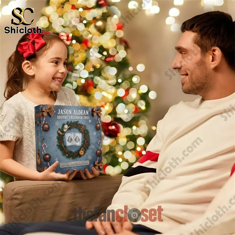 Young girl holding Jason Aldean 2025 advent calendar as a gift by Christmas tree.