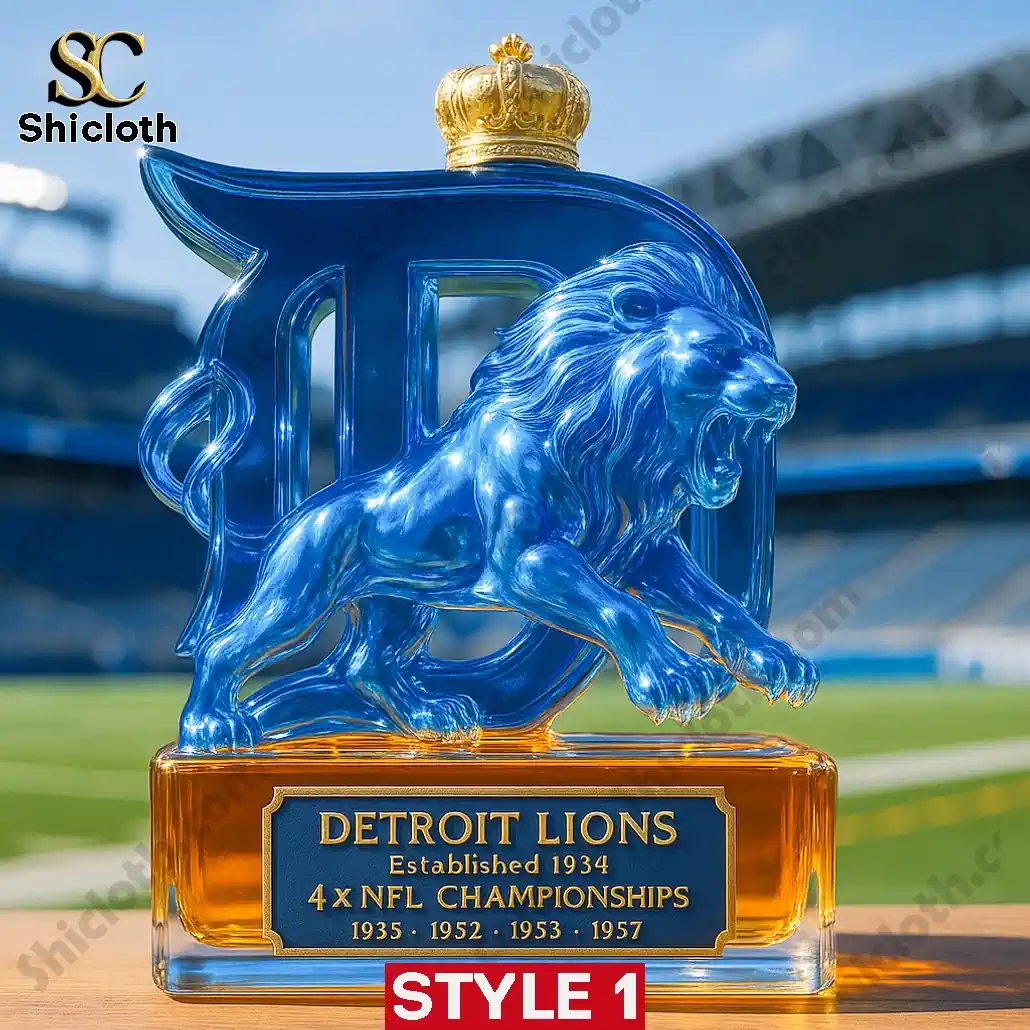A blue Detroit Lions whiskey bottle with a black Old No7 cap and engraved championship years!