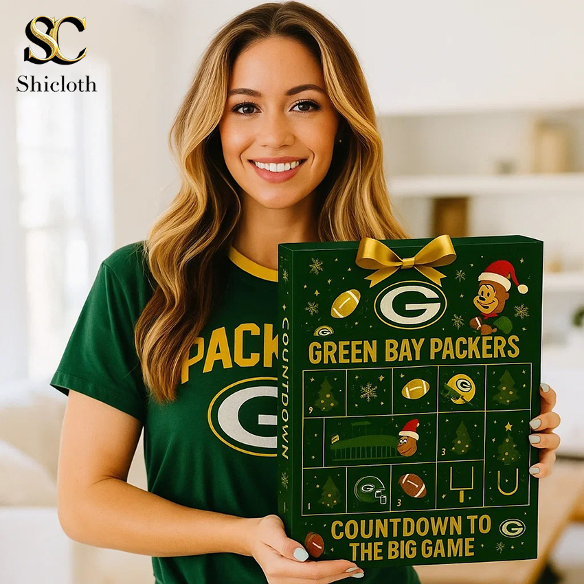 A woman holding the Green Bay Packers Countdown to the Big Game Advent Calendar.