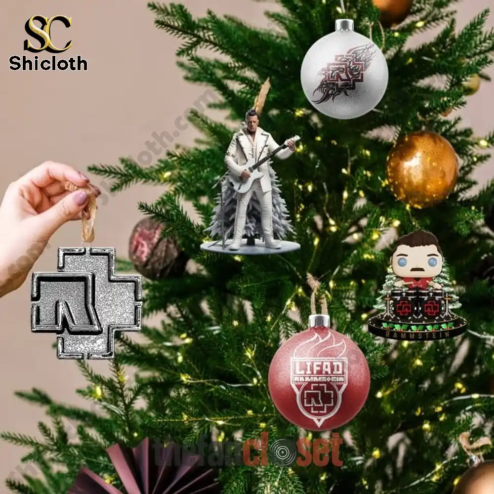 Rammstein Band Christmas 2025 Advent Calendar 4 Rammstein ornaments hanging on a Christmas tree with a hand placing one ornament.