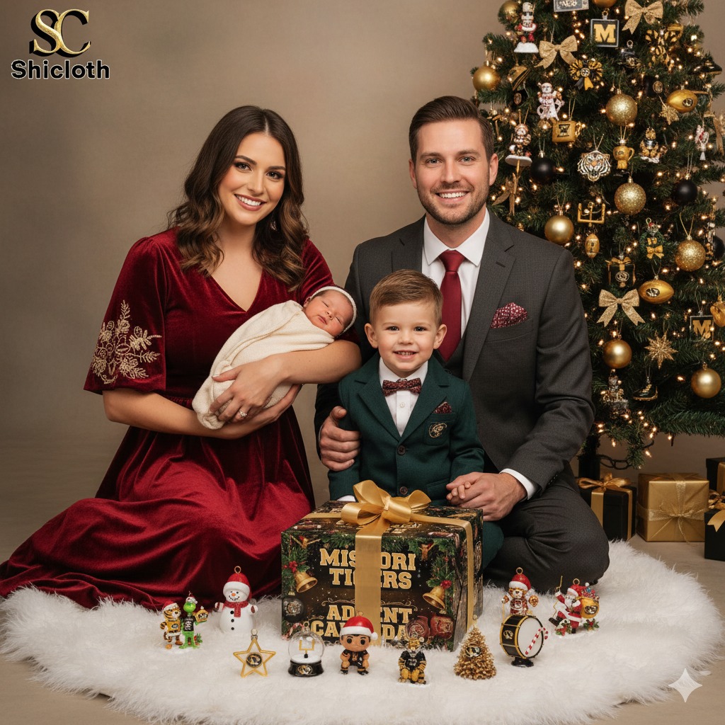 Family posing with Missouri Tigers Advent Calendar 2025 beside Christmas tree