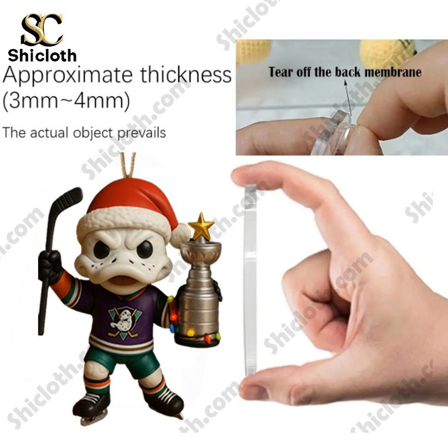 Anaheim Ducks 32nd Anniversary 2025 Advent Calendar 4 Anaheim Ducks mascot figurine with Santa hat holding Stanley Cup trophy.