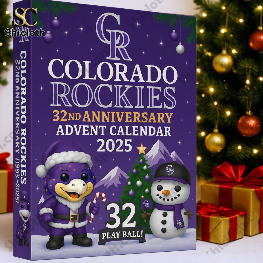 A close up view of the purple Colorado Rockies 32nd Anniversary 2025 advent calendar box next to a Christmas tree!