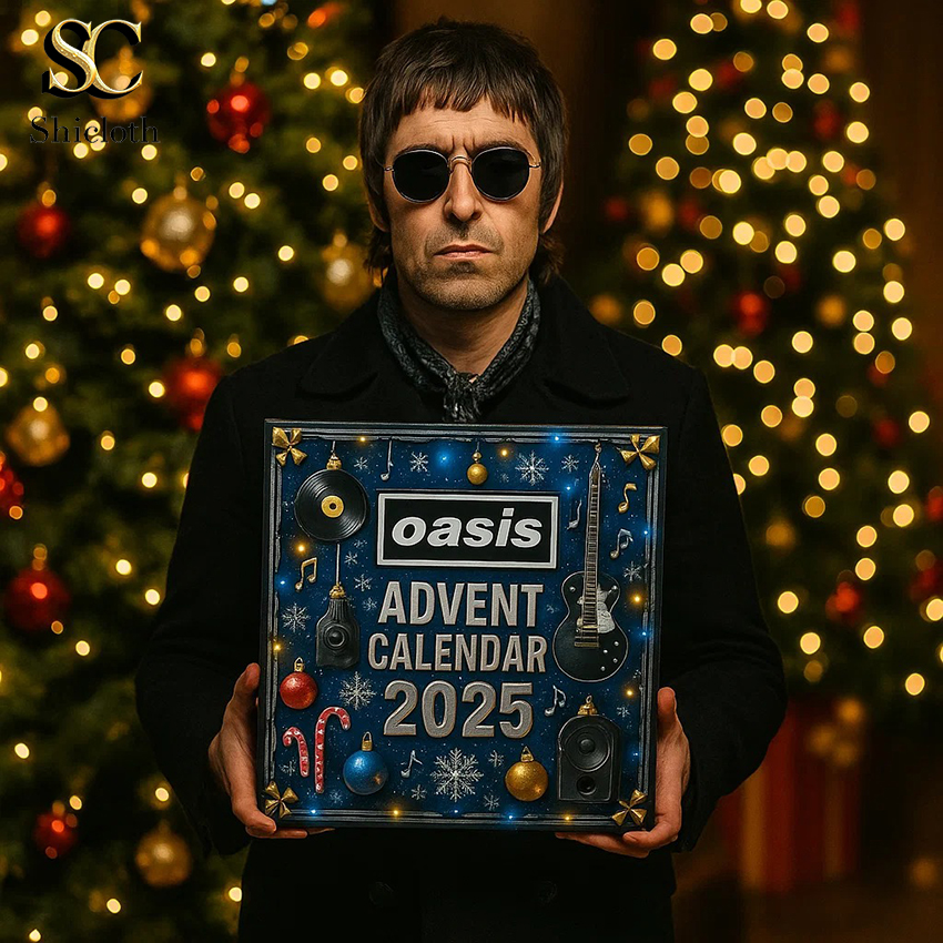 Man holding Oasis Advent Calendar 2025 in front of Christmas tree.