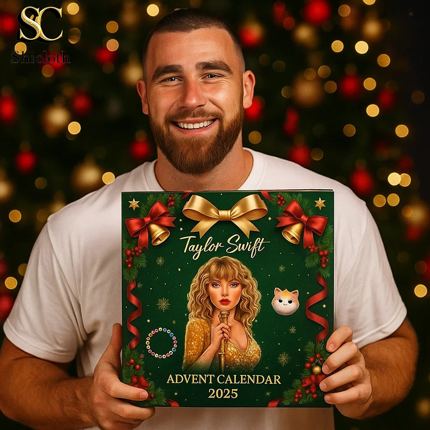 Travis Kelce holding Taylor Swift Advent Calendar 2025 box in front of Christmas tree.