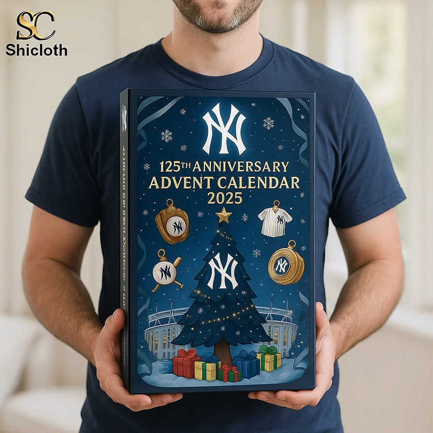 Man holding a New York Yankees 125th Anniversary Advent Calendar 2025 with a Christmas tree design.