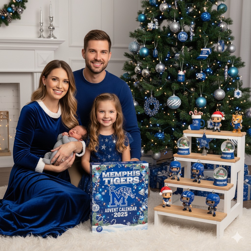 A family sitting by a Christmas tree holding the Memphis Tigers Advent Calendar 2025 box.