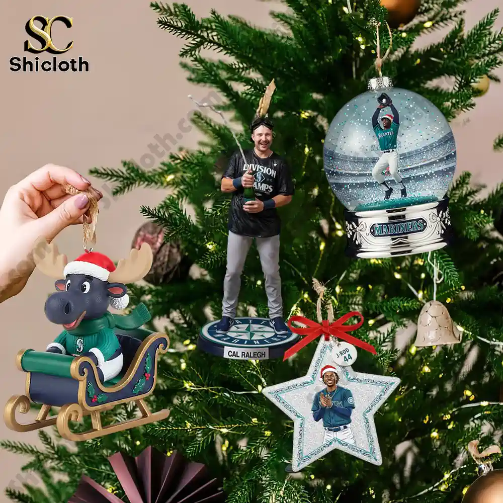 Premium 24 Days of True Mariners Spirit Seattle Mariners Advent Calendar 2025 4 Seattle Mariners themed ornaments hanging on a decorated Christmas tree including player figures and a team moose.