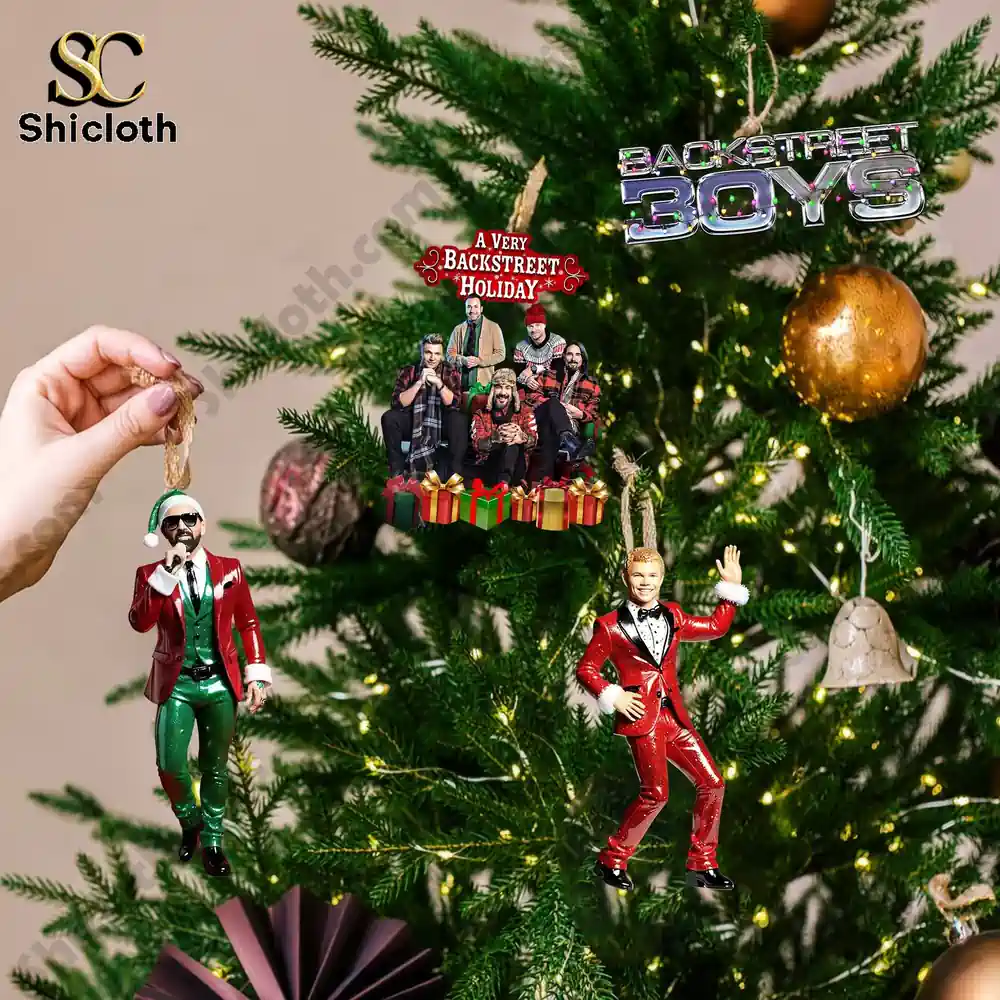 Backstreet Boys Advent Calendar 2025 4 Hand hanging Backstreet Boys ornaments from the 2025 Advent Calendar on a Christmas tree!