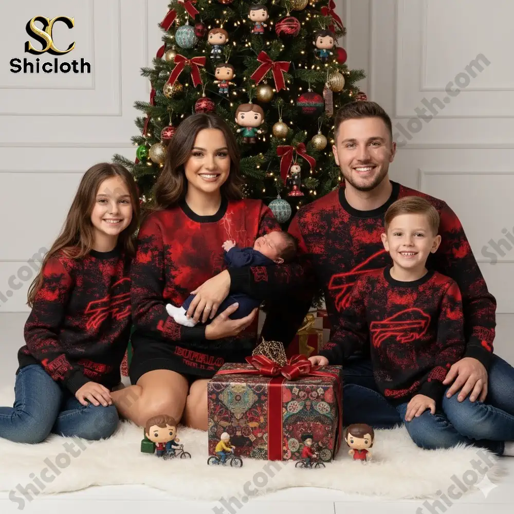 A family wearing matching red and black Buffalo Bills sweaters sits by a decorated Christmas tree with gifts.