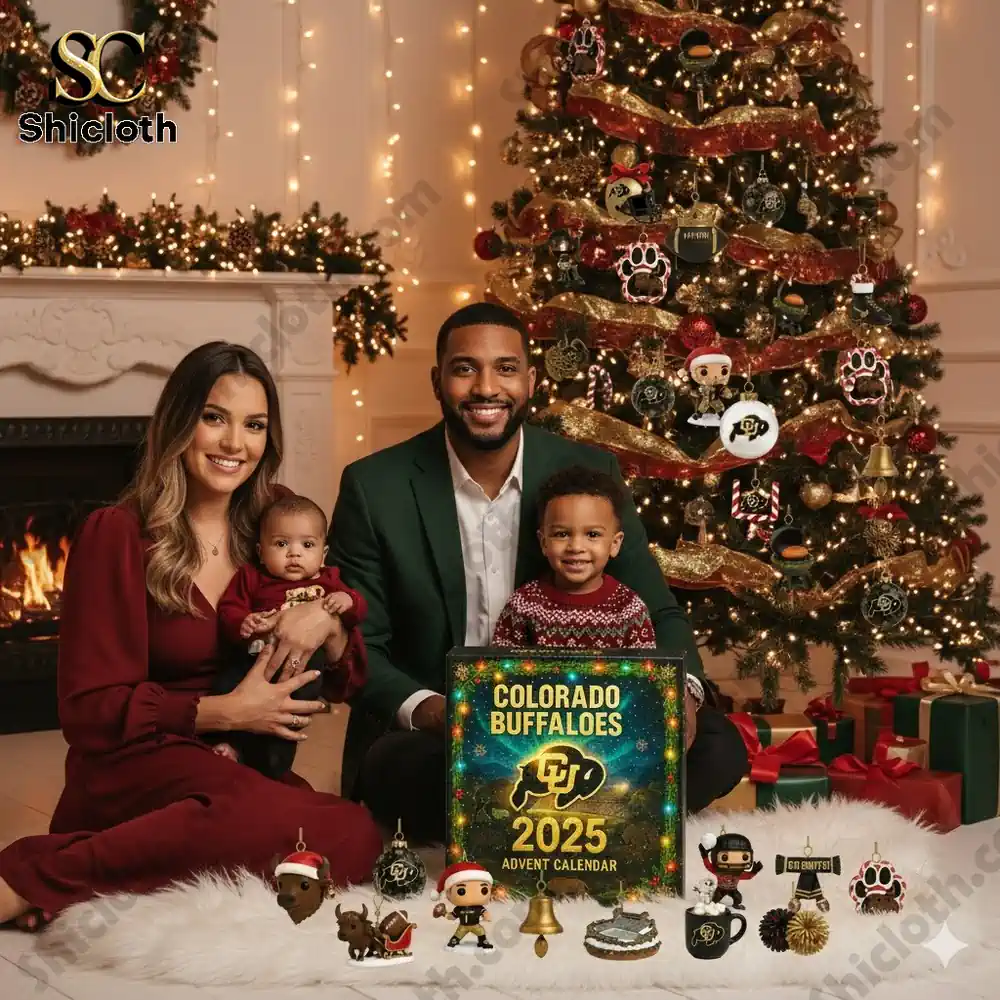 A family poses in front of a Christmas tree decorated with Colorado Buffaloes ornaments and an Advent Calendar box.