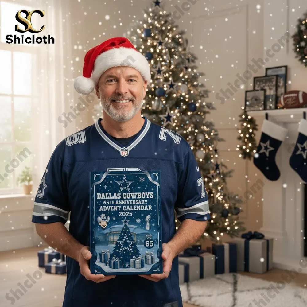 A man wearing a Santa hat holds the Dallas Cowboys 65th Anniversary Advent Calendar 2025 in front of a decorated Christmas tree!