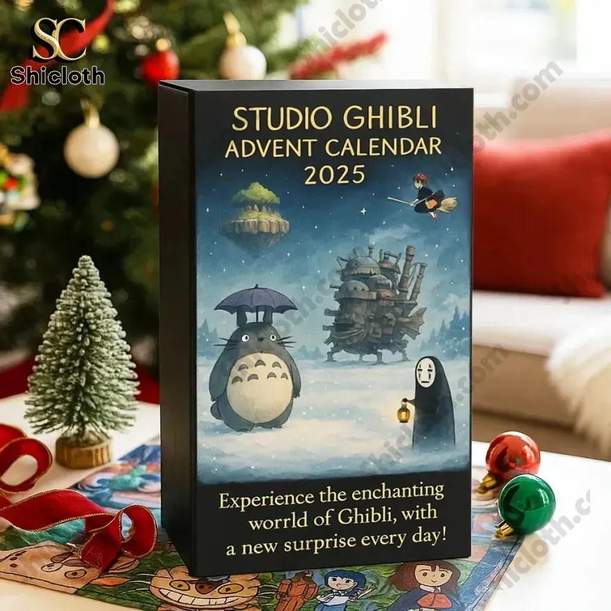 A Studio Ghibli Advent Calendar 2025 box placed on a festive table with a small Christmas tree and colorful ornaments.