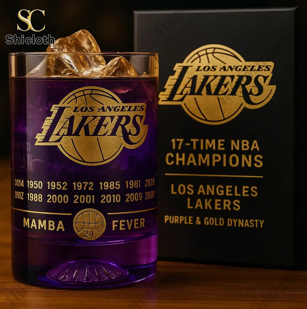 Los Angeles Lakers commemorative glass celebrating 17 NBA championships with gold logo and text.