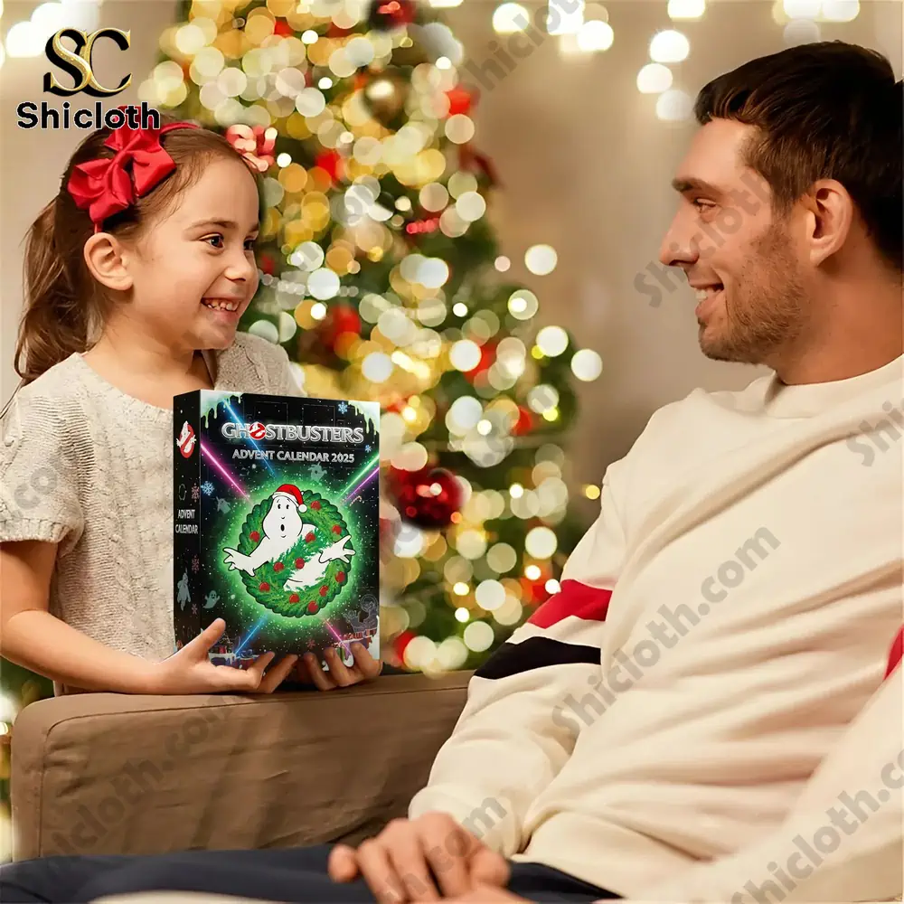 Ghostbusters Premium Advent Calendar 2025 5 A smiling girl giving her father the Shicloth Ghostbusters Advent Calendar 2025 by a Christmas tree!