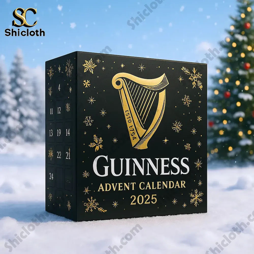 New Guinness Advent Calendar 2025 2 Guinness Advent Calendar 2025 box standing on snow with a Christmas tree in the background.