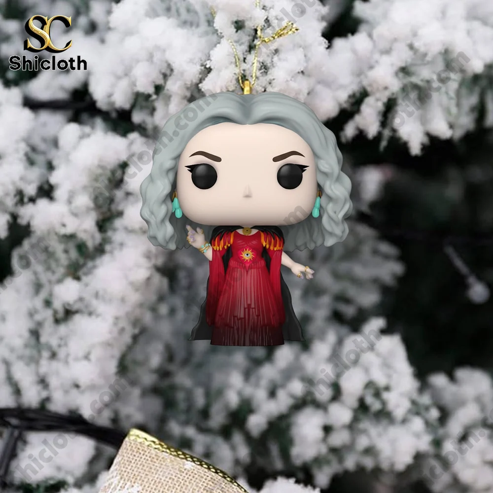 Hocus Pocus character ornament hanging on a snowy Christmas tree branch.