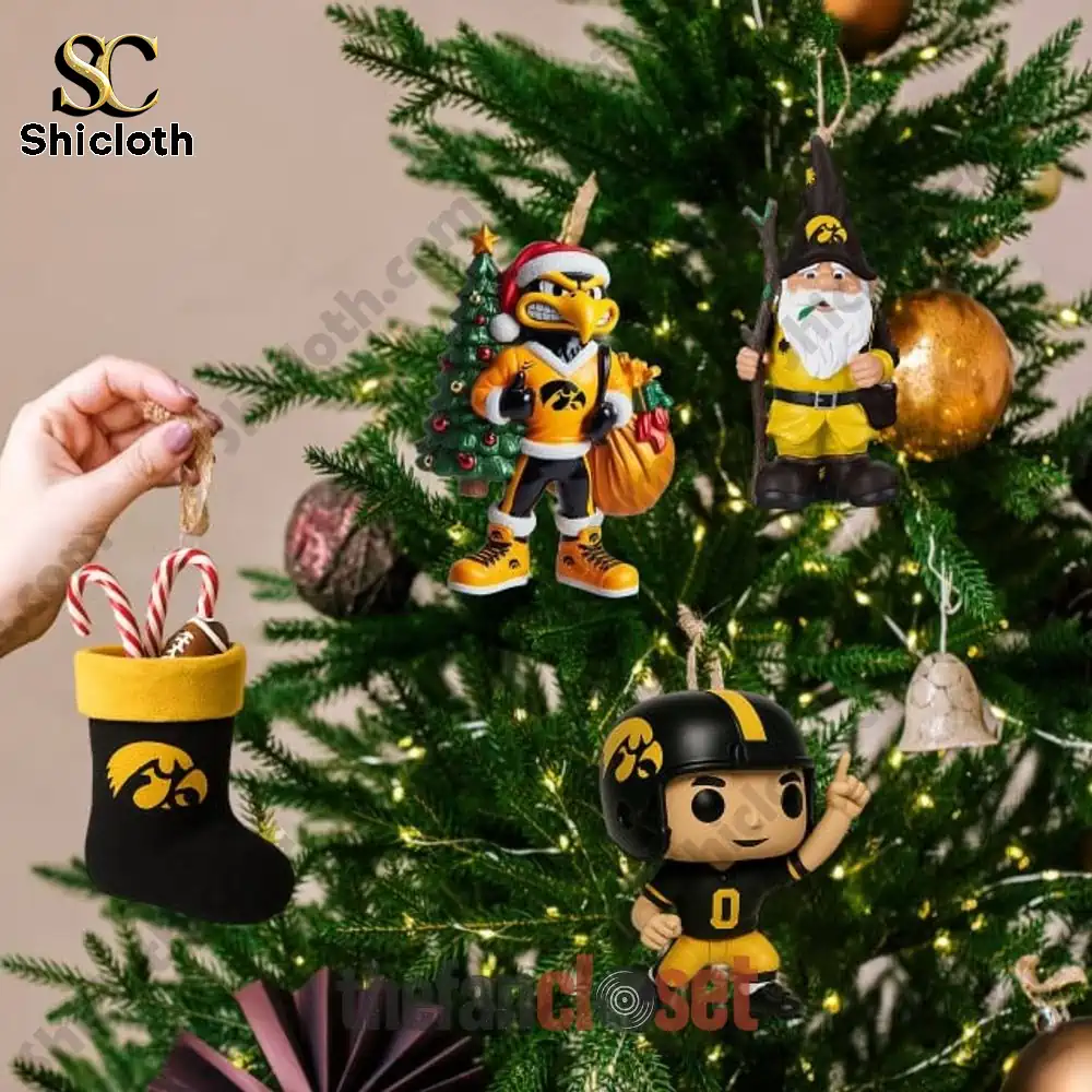 Iowa Hawkeyes Christmas 2025 Advent Calendar 4 Iowa Hawkeyes Christmas ornaments hanging on a decorated tree.