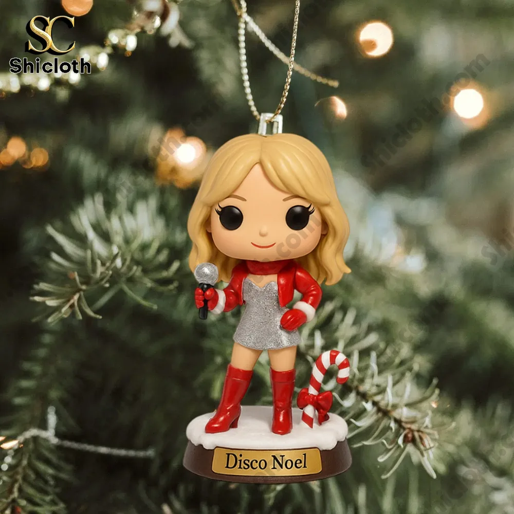 Kylie Minogue Premium Advent Calendar 2025 5 A Disco Noel holiday figurine ornament hangs on a Christmas tree branch.