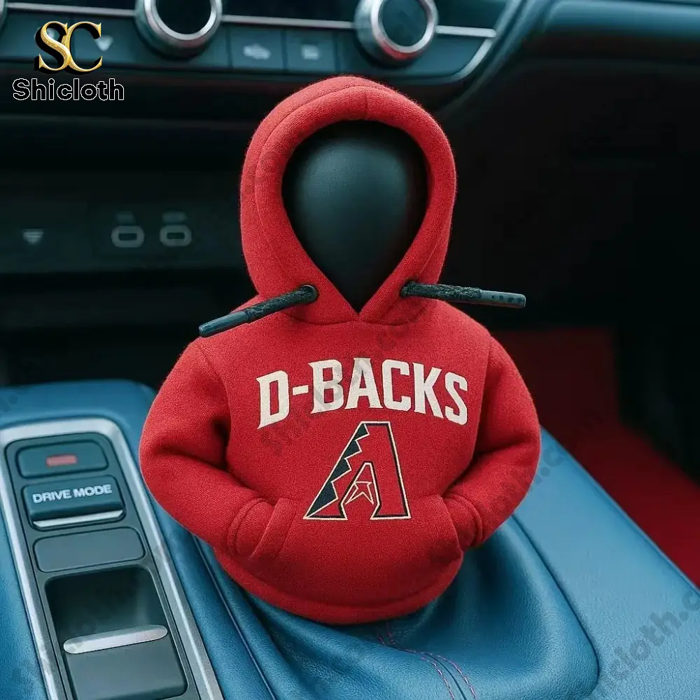 A car gear shift knob dressed in a red D-Backs hoodie inside a vehicle interior!