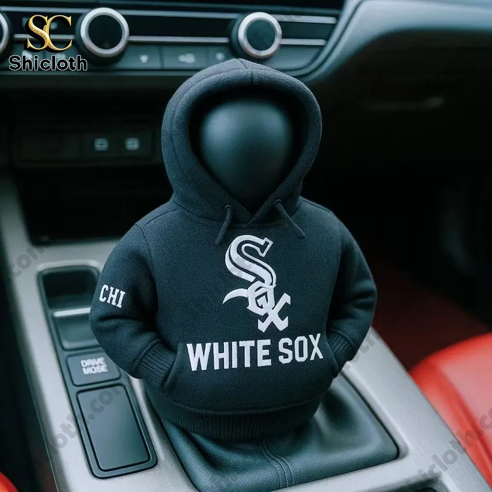 A car gear shift knob dressed in a black White Sox hoodie inside a car interior!