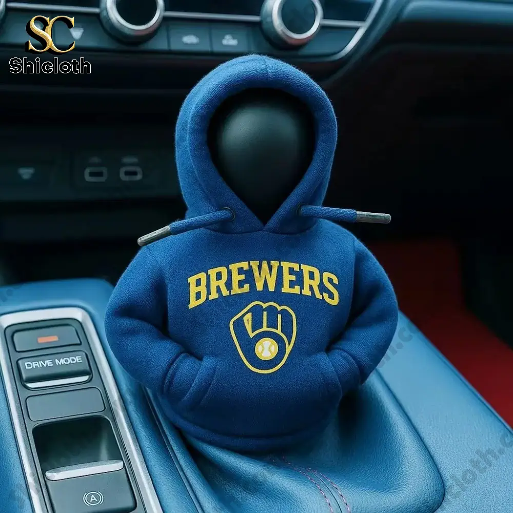 A blue Milwaukee Brewers hoodie cover on a car gear shift knob inside a car!