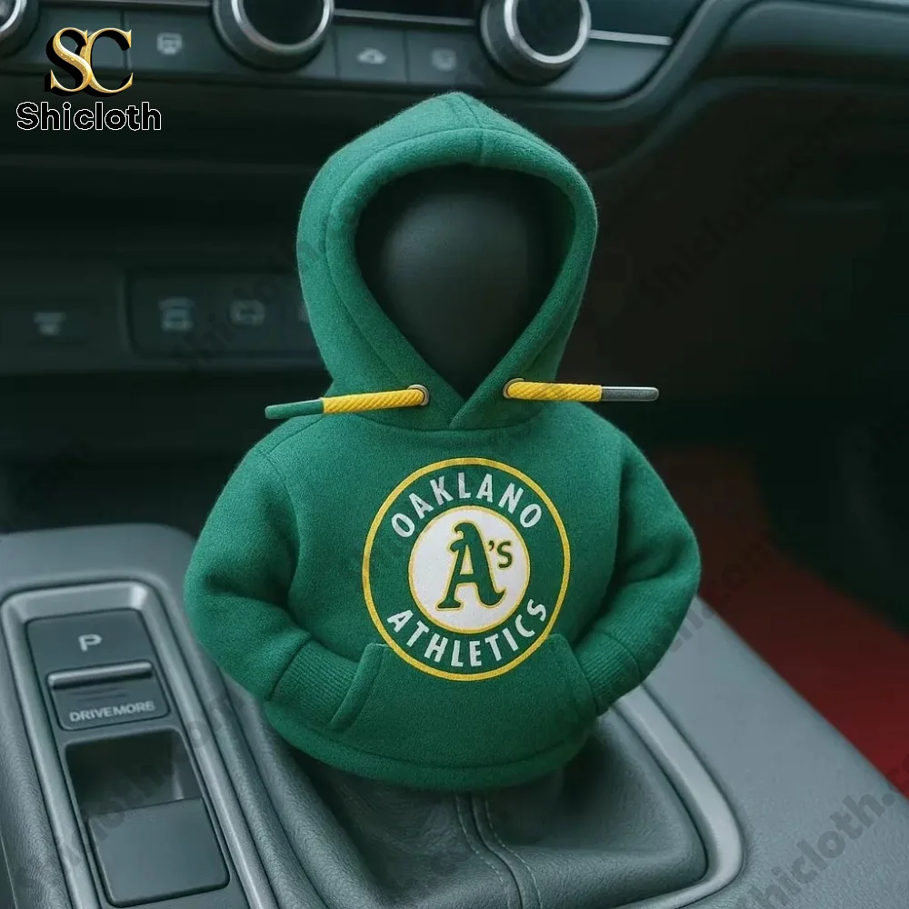 Green hoodie with Oakland Athletics logo covering a car gear shift knob!