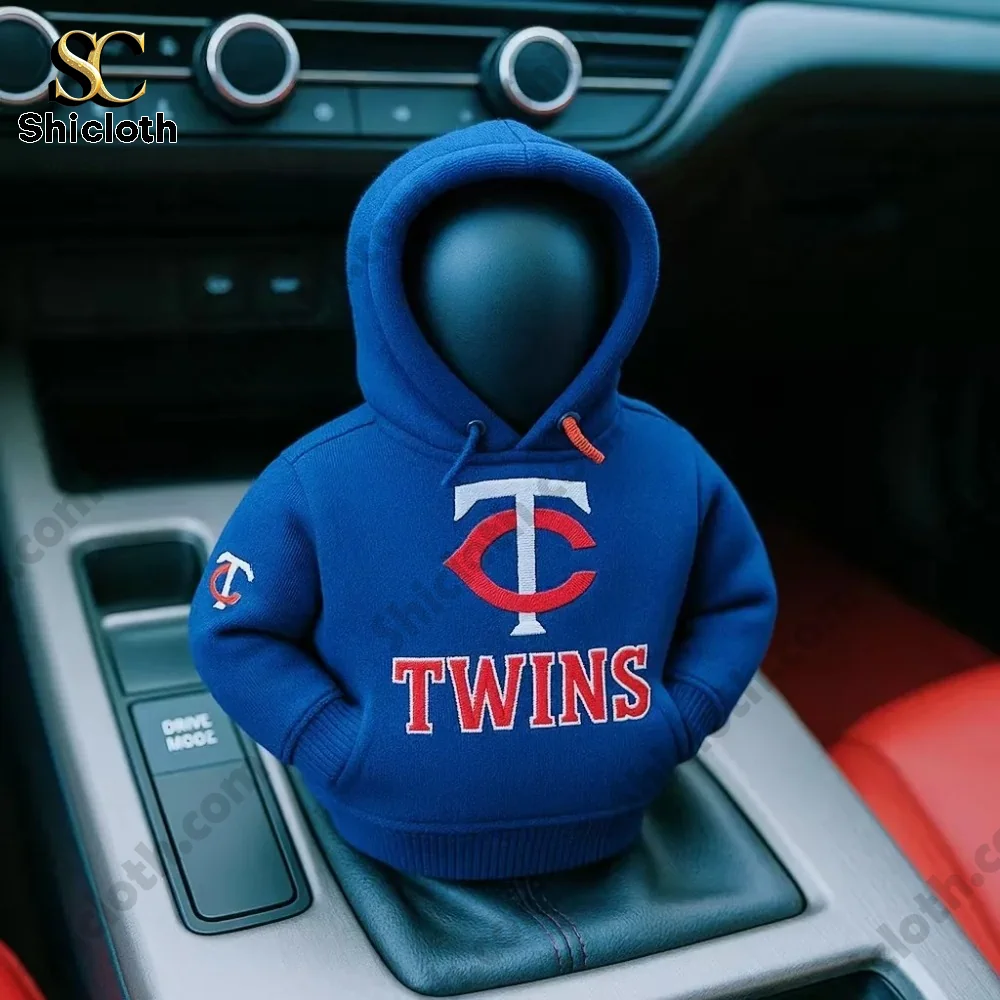 Blue hoodie with Minnesota Twins logo covering a car gear shift knob!