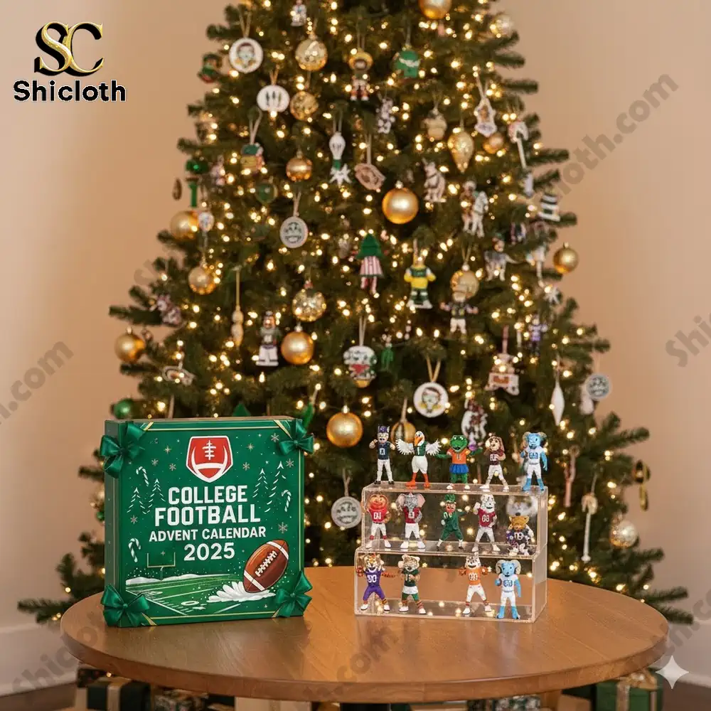 College Football Advent Calendar 2025 box displayed beside a decorated Christmas tree with football team mascot figures on a table.
