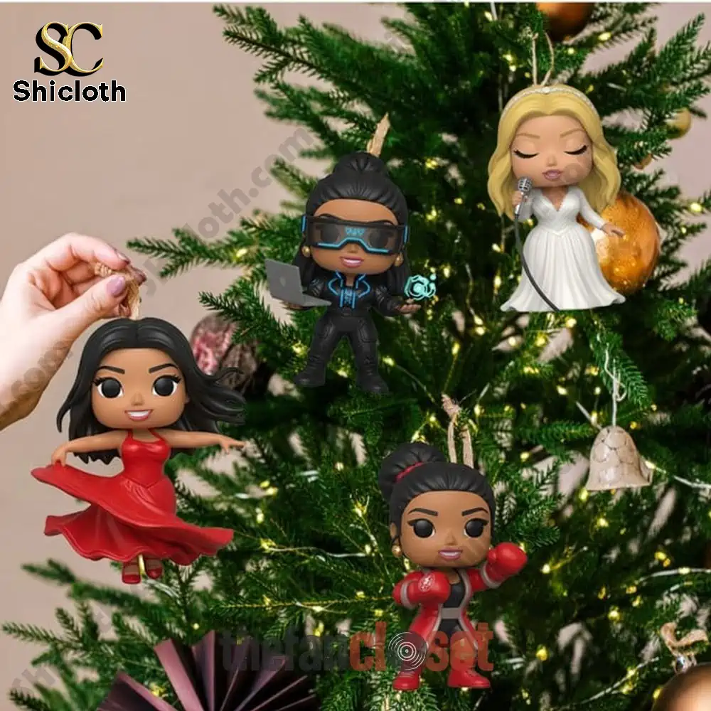 Nicki Minaj Barbie Dream Christmas Advent Calendar 2025 4 Barbie Dream Christmas Shicloth mini figures hanging on a Christmas tree.