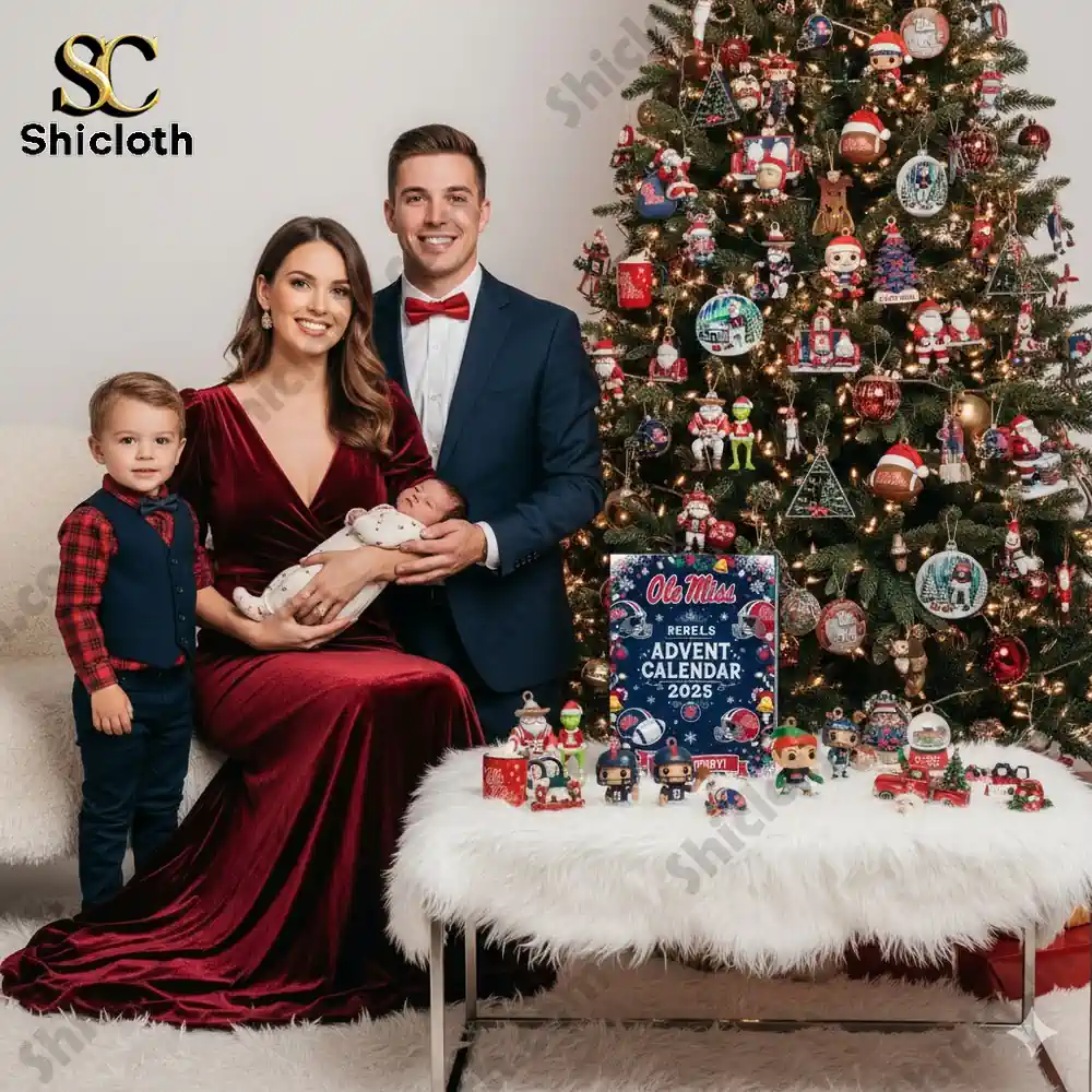 Family posing with Ole Miss Rebels Advent Calendar 2025 by the Christmas tree!