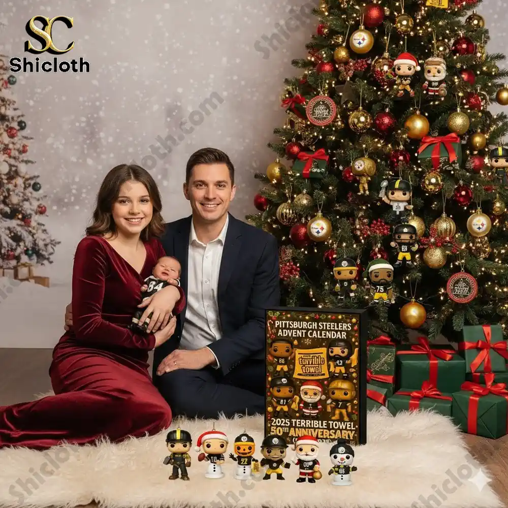 A family poses by a Christmas tree with the Pittsburgh Steelers Advent Calendar and themed ornaments on display!