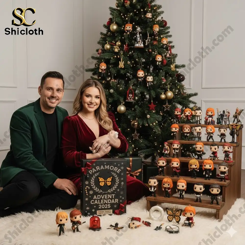 A couple sitting beside a decorated Christmas tree with the Shicloth Paramore Advent Calendar 2025 display.