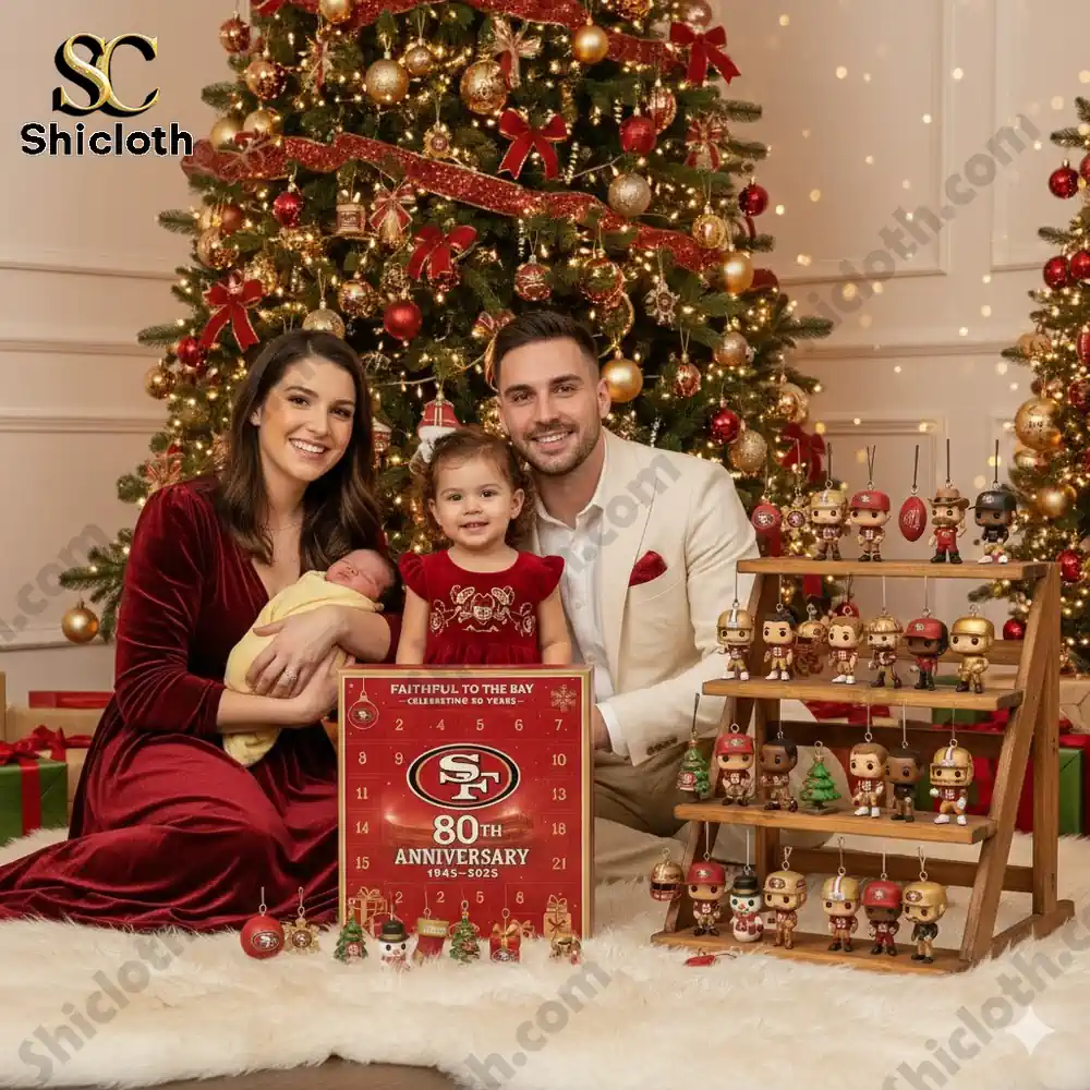 A family posing by a Christmas tree with the San Francisco 49ers 80th Anniversary Advent Calendar and themed figures.