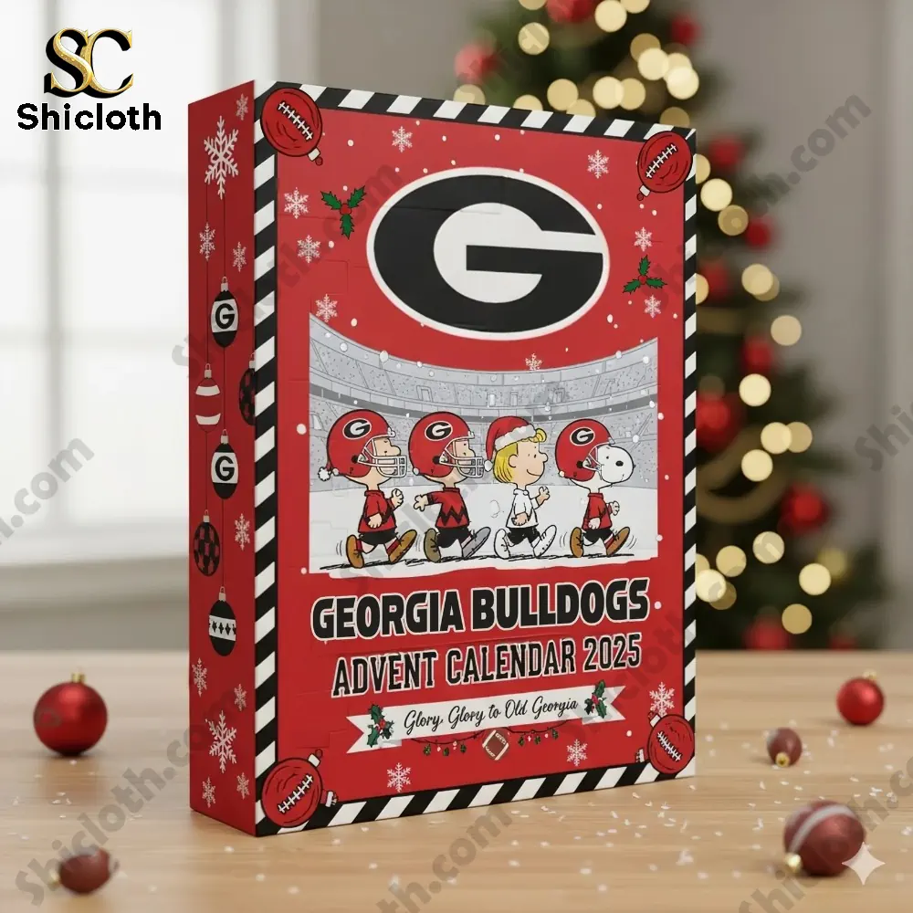 Snoopy Georgia Bulldogs Advent Calendar 2025 Official University Of Georgia Holiday Gift Set 3 Georgia Bulldogs Advent Calendar 2025 box by Shicloth displayed beside a Christmas tree!
