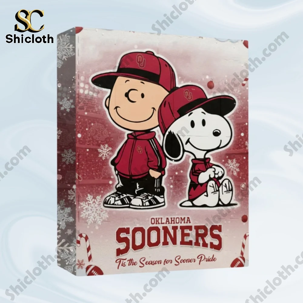 Snoopy Oklahoma Sooners Advent Calendar 2025 3 Close up of Oklahoma Sooners Snoopy advent calendar box with Charlie Brown and Snoopy on red snowy background.