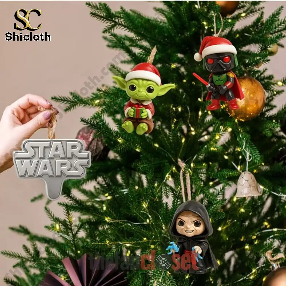 Star Wars Unwrap The Dark Side Of Christmas Advent Calendar 2025 3 Star Wars Christmas tree ornaments featuring Baby Yoda, Sith, and Emperor designs.