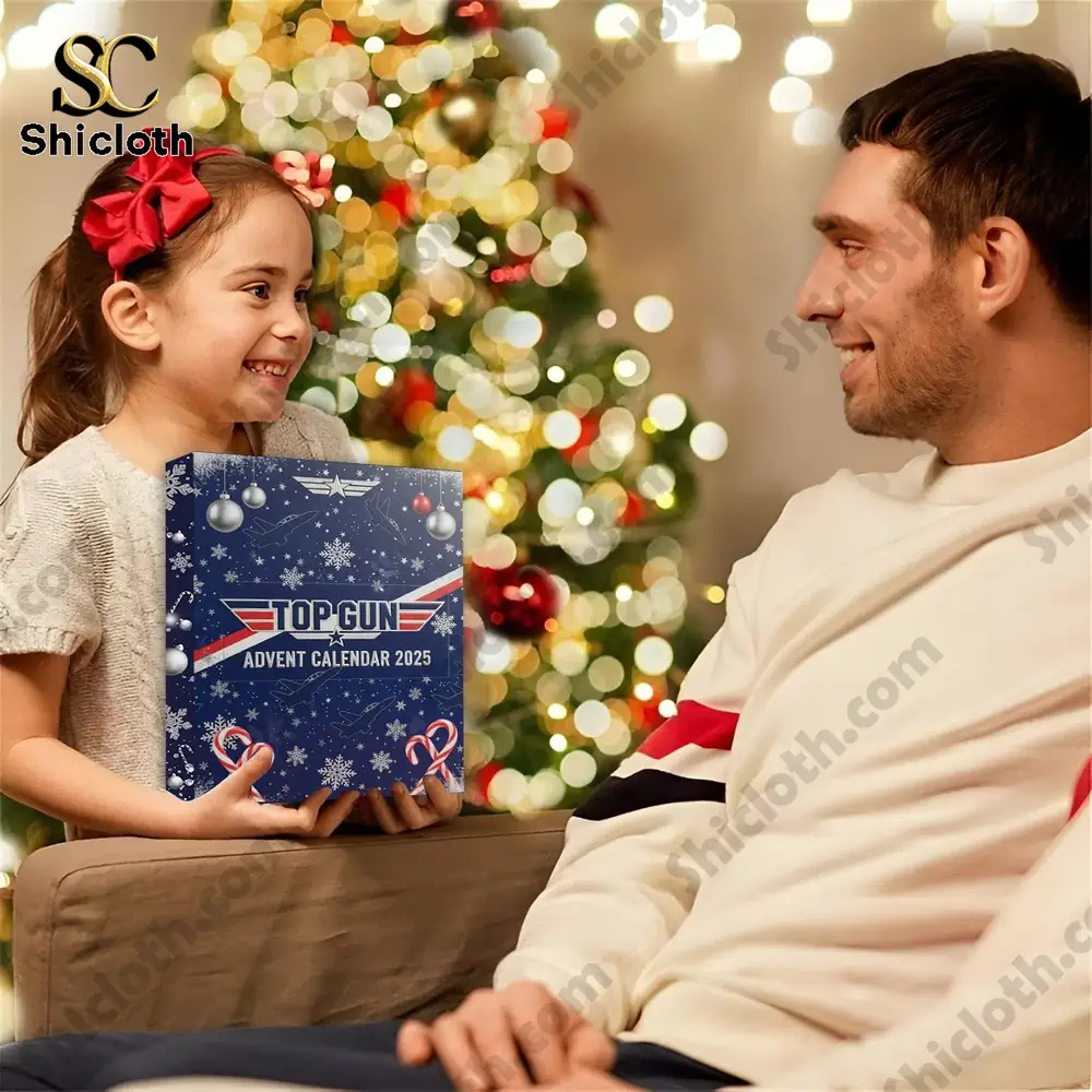 Top Gun Premium Advent Calendar 2025 5 A little girl giving her father the Top Gun Advent Calendar 2025 box by a Christmas tree.