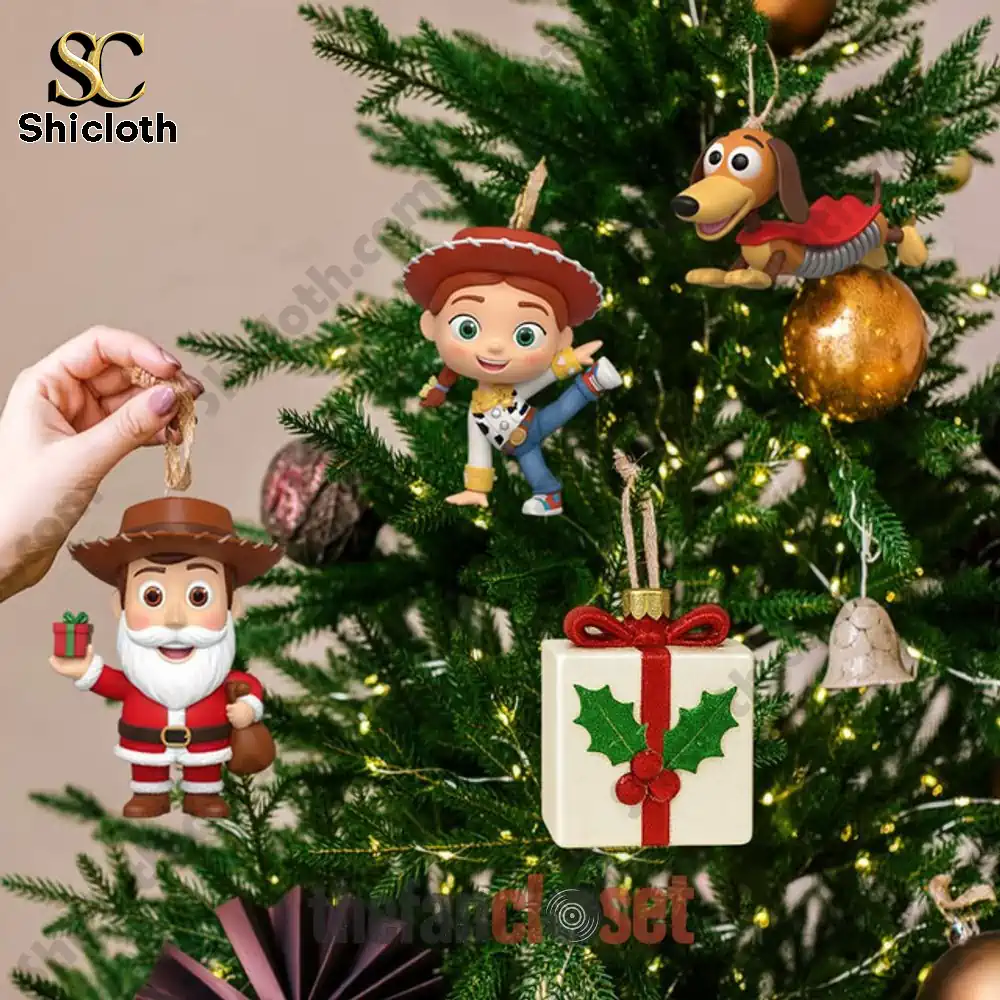 Toy Story Toy Chest Christmas 2025 Advent Calendar 4 Toy Story character figurines hanging as Christmas ornaments on a tree.