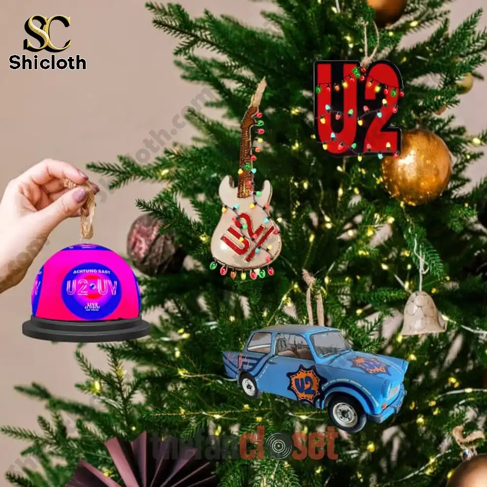 U2 Band Christmas 2025 Advent Calendar 4 Christmas tree decorated with U2 themed ornaments including guitar, car, and logo.